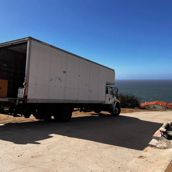 Titan Relocation long distance movers in Los Angeles County carefully loading and securing furniture for a long-distance move