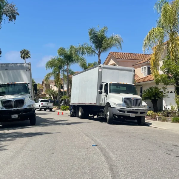 Titan Relocation Residential moving in Los Angeles County, California—movers protecting furniture and loading boxes into a moving truck