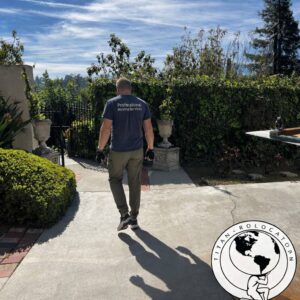 Professional safe movers transporting luxury home furnishings